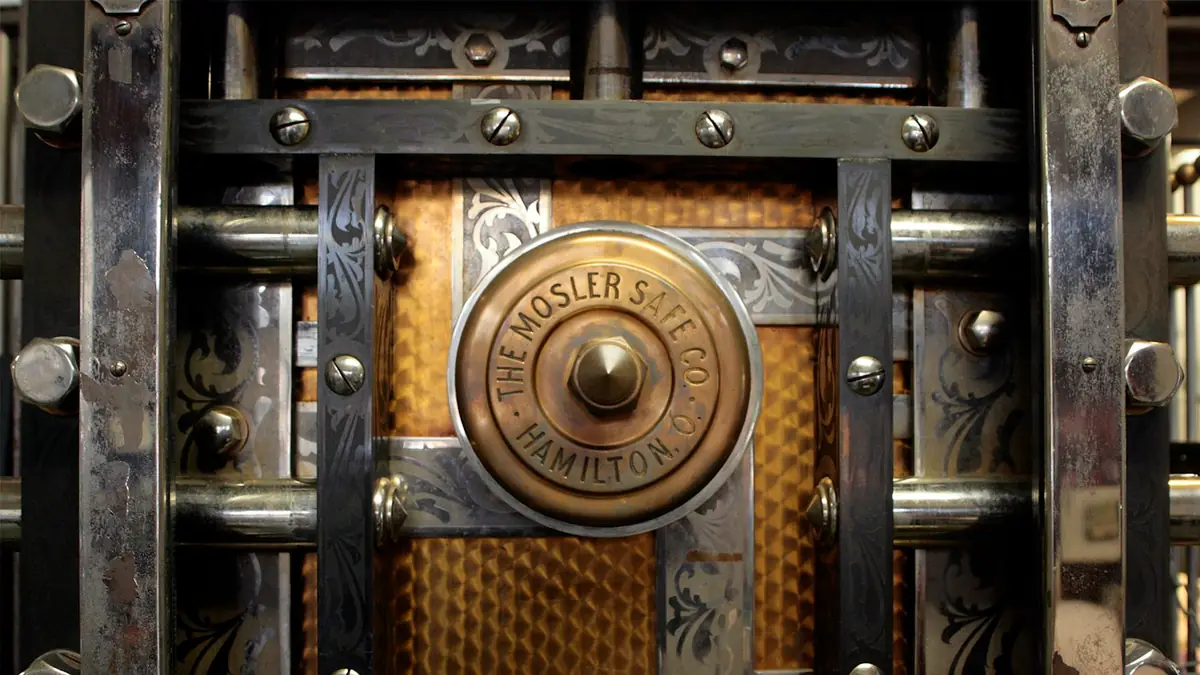 a close up of a metal door with a lock
